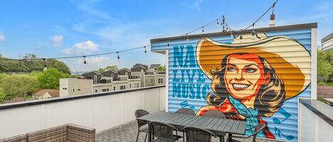 Live like a Country Music legend on our rooftop patio!