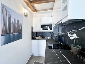 Explore culinary delights in the multifunctional kitchen space.