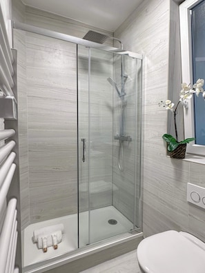 Refresh and rejuvenate in the well-equipped, newly renovated bathroom