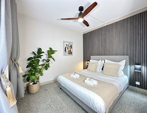 Elegantly appointed Queen-size bedroom for ultimate relaxation