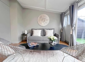 A modern living room with a comfortable sofa.