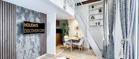 The property features a beautiful mezzanine to separate the bedroom from the living area, accommodating up to 4 guests.