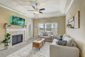 Living room with Full Sleeper Sofa and SMART TV. YouTube TV will be provided. :)