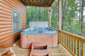 Relax and enjoy the hot tub on the terrace deck