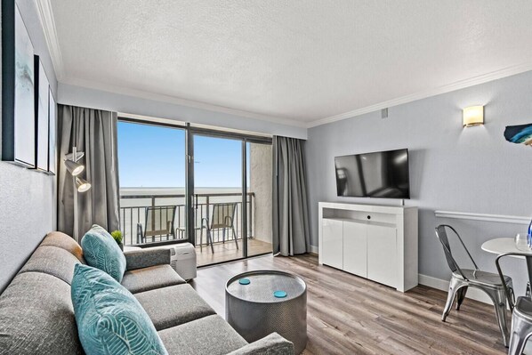 Step into a bright and inviting living space that radiates warmth, creating a sanctuary for comfort and togetherness