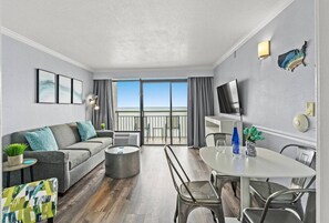 Step into a bright and inviting living space that radiates warmth, creating a sanctuary for comfort and togetherness