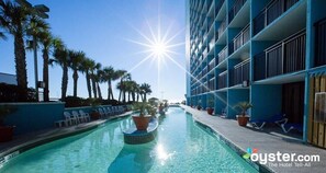 Take a dip into the pristine waters of our outdoor pool, offering crystal clarity that beckons guests for a refreshing swim.