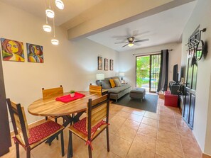 The unit has an open concept main floor has a comfortable living space, dining area, half bath, full kitchen and screened back terrace with laundry and gas BBQ.