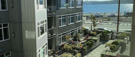 Deck overlooks garden and the Seattle waterfront.  3rd floor of 5 floor complex 