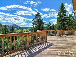 Enjoy the massive elevated deck w/ outdoor seating.