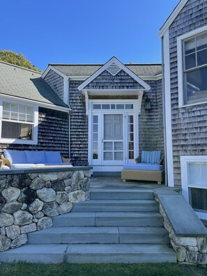 One of the entryways with outdoor seating