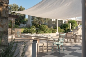 A shaded outdoor dining area for culinary dining.