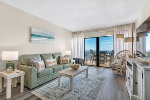 Living Area - This spectacular unit offers brand new flooring and fresh paint throughout.