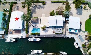 Aerial view. See red star. Ocean access. 