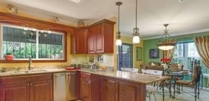 Kitchen counters, Counters with high chairs, Bar great for eating and visiting!
