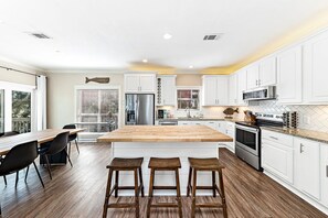 Fully loaded chef's kitchen with an open layout