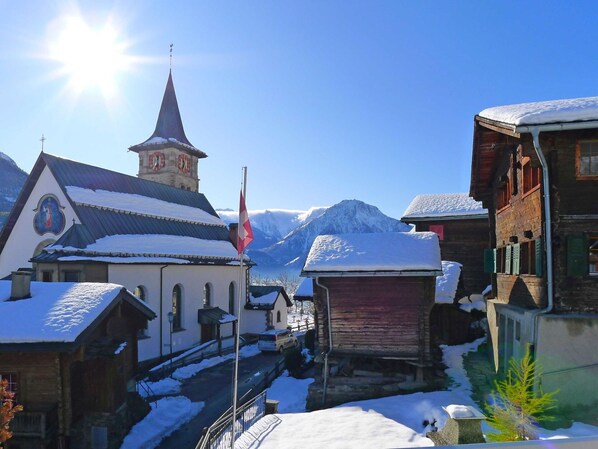 Sky, Property, Snow, Building, Window, Mountain, Freezing, Slope, Cloud, Glacial Landform