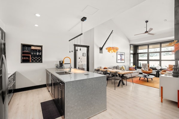 Kitchen and Main Living Area with Vaulted Ceilings, Wine Rack, Views of the Slopes