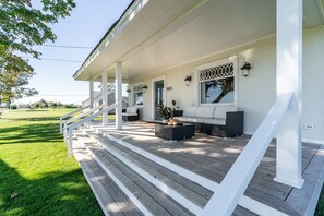 Spacious front porch overlooks the well known Oregon Road