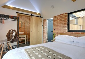 Bedroom through to the shower room