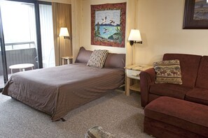 Studio with murphy bed and sleeper sofa.
