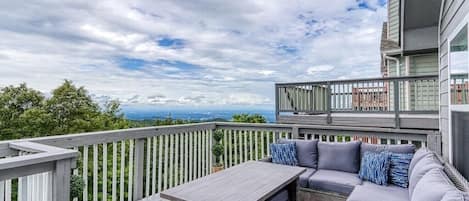 Tranquility Skies' deck with stunning views