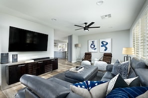 Living room with large screen smart TV