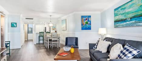 You'll love how the spacious condo flows from the gleaming kitchen to the dining area for six to the comfortable outfitting living room.