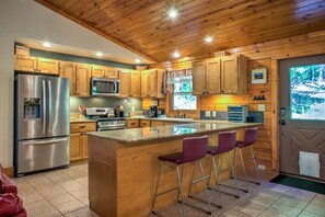 Fully Equipped Kitchen with Breakfast Bar Seating