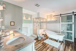 Gorgeous master bathroom, solid teak flooring, double marble vanity, walk in sho