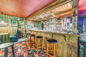 Your own commercial size bar with private drinking room behind