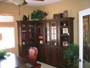Office / Library. Contains classic and popular reading. 
