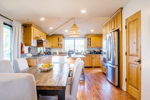 Open concept with space for everyone to be together and share a meal.