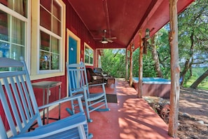 Large front porch with rocking chairs