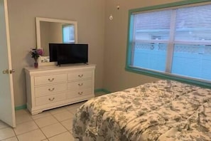 White Bedroom with Antenna TV