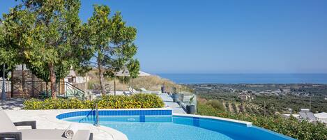 This luxury Villa is blissfully tucked away commanding breathtaking coastal view