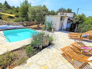 External view of the building. Villa Luna terrace and the pool