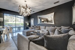 Comfortable and Entertaining living room with open floorplan to socialize with dining room as well. Start with a cocktail and move onto dining in modern social atmosphere catering for your entire family, bachelor/birthday party or corporate retreat.
