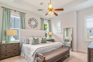 Spacious Master with incredibly comfy bed, plantation shutters, and room darkening shades