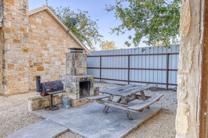 Cabin has its own side patio area with a picnic table, charcoal bbq pit and fire pit.