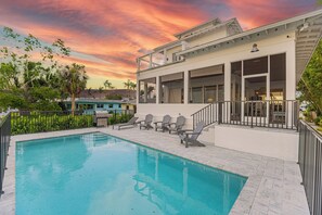 Swim in the 30 ft heated pool while overlooking the water