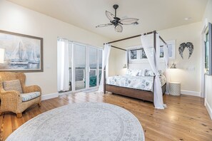 2nd floor romantic owner's suite with private patio overlooking the water