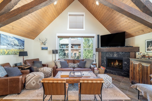 Such a cozy gathering spot in the great room with a fireplace.