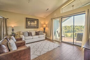 Living Room | Private Balcony w/ Golf Course Views