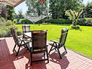Furniture, Chair, Outdoor Furniture, Table, Outdoor Table, Garden, Shade, Lawn, Patio