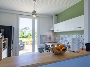 Kitchen, Countertop, Interior Design, Kitchen Appliance, Flooring, Ceiling, Major Appliance, Furniture, Floor, Light Fixture