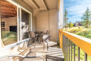 Private deck with outdoor seating.