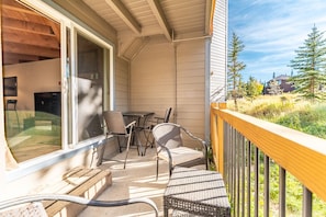 Private deck with outdoor seating.