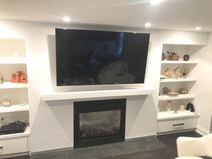 Large TV over gas fireplace