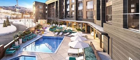 Pool deck and the view from the backside of the building -heated & open all year